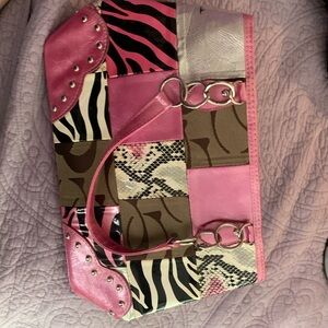 Faux coach punk zebra striped bag